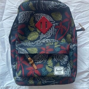 Herschel Supply Co. Black Backpack with Red, Green, and Yellow Leaf Design